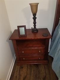 Modern side table with elegant lamp.