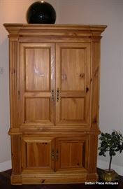 Modern pine Armoire, 81 inches tall, 22 inches deep, and 48 inches across