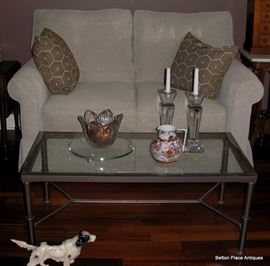 Contemporary Loveseat, Metal and Glass Coffee Table, the bowl is a Waterford Crystal Bowl, Asian Kutani Pitcher, Pair of Towle Candlesticks.
