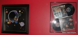 Vasily Kadinsky print  on the left and a Beatles Collage on the right.