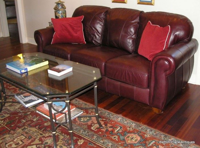 Fabulous Lane Leather Sofa, Glass top Metal Coffee Table and a 8ft 8 inch x 12 ft Karastan carpet.