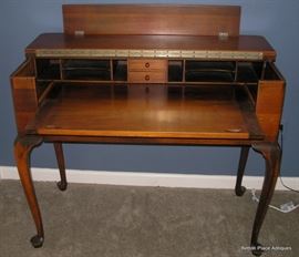 Spindle Cherry Desk opened to show pullout and cubbies
