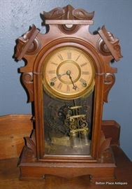 Antique Ansonia Walnut Clock in working Condition, and has a beautiful tone