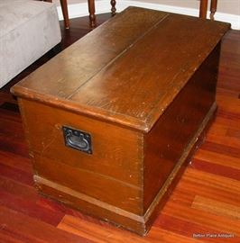 Antique Trunk, measuring 21 1/2 inches deep, 36 12 inches wide and 21 1/2 inches tall.