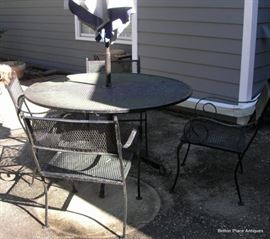 Table with 4 Chairs and Umbrella
