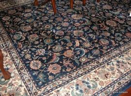 :Large Area Rug in Dining Area