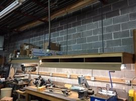 Overhead shelving with lighting.