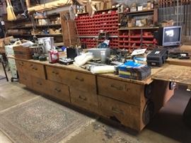 This shop table is 12' 3" X 5' 4" (huge). Bring Help!