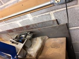 Two huge pieces of sheet metal. These sheets are 12' long, 39" wide and about a 1/4 thick! You are on your own, bring help!