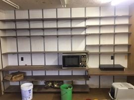 Lots of shelving in the outer office. Ask to see it if you are interested.