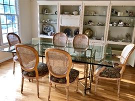 Love this Glass Top Dining Room Table and Chairs! The base of the table is the best!