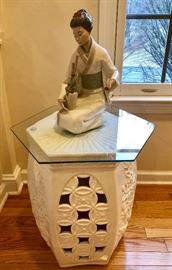 Garden bench with glass top. Nao porcelain atop.