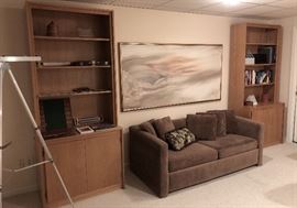 Two nice bookcases, MCM style, with storage beneath. Great small sofa between!