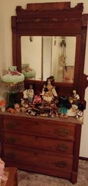 We moved the dolls--lovely Eastlake, red marble-topped dresser