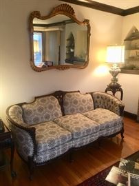 Curved Antique 40's French Sofa, Capi di Monte Lamp, French Style Mirror