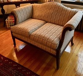Camel back two cushion Loveseat