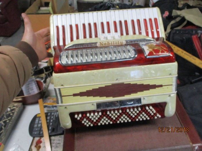 nice red Nobility accordian good shape