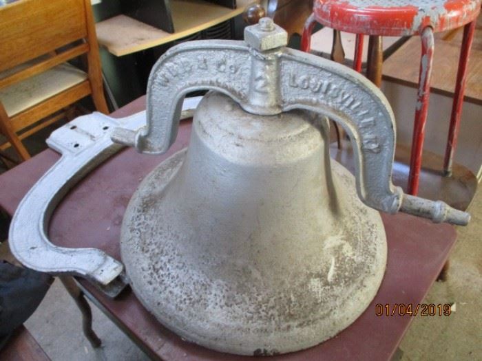 cast iron bell with yoke from Louisville Ky