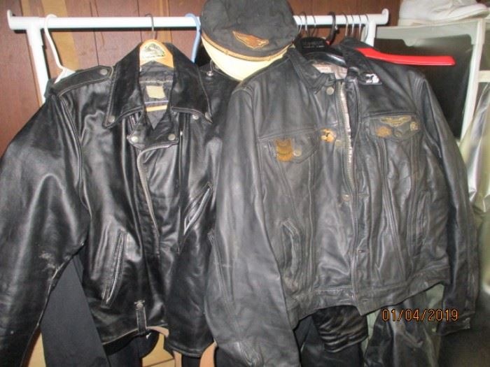 2 leather marked Harley coats small size left is AMF right has pins and a hat
