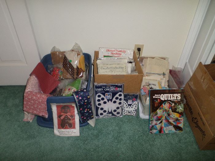 box with some of the quilt squares & needlework paterns