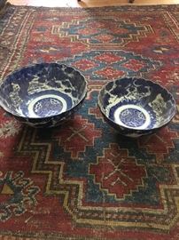 Asian porcelains and one of several antique rugs