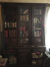 Large 1865-1885 walnut bookcase full of older and old books