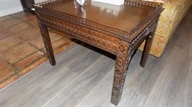 end table with carving/gallery