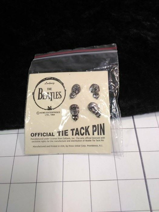 Beatles tie tack pins. https://ctbids.com/#!/description/share/86452