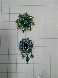 Two vintage teal and blue crystal brooches   https://ctbids.com/#!/description/share/86472