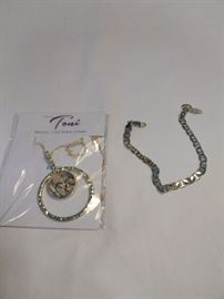 designed by Tony mother of pearl necklace with bracelet   https://ctbids.com/#!/description/share/86397