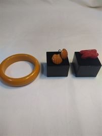 two pairs of Bakelite earrings and one Bakelite bracelet https://ctbids.com/#!/description/share/86414