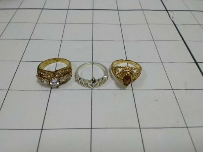 set of 3 costume rings . size unknown https://ctbids.com/#!/description/share/86426