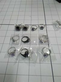 Lot of 10. Size 6, 7, 8, unmarked: silver banded rings with purple jewels https://ctbids.com/#!/description/share/86430