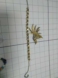Phoenix Bird and gold bracelet https://ctbids.com/#!/description/share/86460