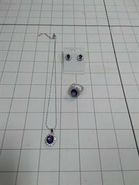 Purple and clear crystal necklace, earrings, and ring set https://ctbids.com/#!/description/share/86470