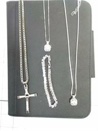 2 matching rhinestone pendant necklaces, silver and rhinestone cross necklace and rhinestone    https://ctbids.com/#!/description/share/86489