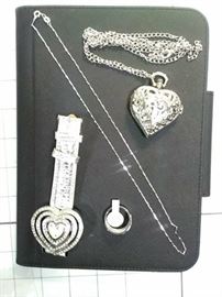 All hearts-silver and rhinestone wristwatch, ring, and necklace locket watch and silver chain https://ctbids.com/#!/description/share/86488