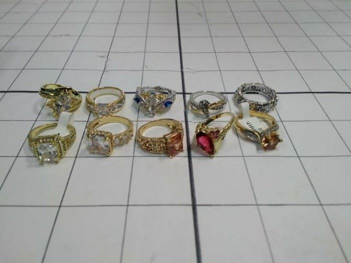 lot of 10 size 7 gold and silver color banded rings, with various stone color   https://ctbids.com/#!/description/share/86427