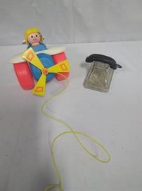 airplane pull toy and a glass Toy Telephone https://ctbids.com/#!/description/share/86528