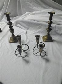 2 brass candlesticks and silver candle holders
https://ctbids.com/#!/description/share/86557           