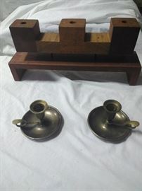 1 wooden candle holder and two brass candle holders  https://ctbids.com/#!/description/share/86558