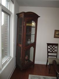 Antique Worm hole curio cabinet
