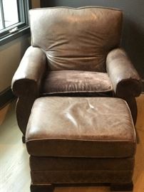 Leather club chair and ottoman with a mohair seat cushion. 