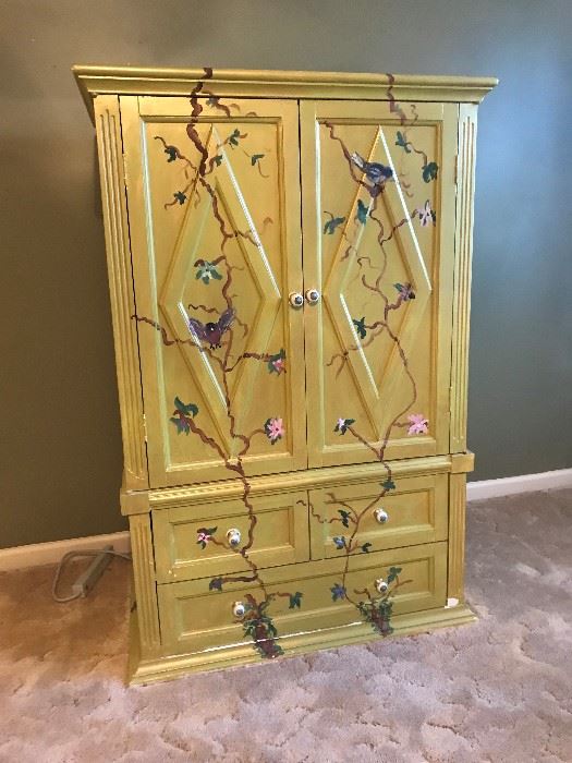 Large tv/ storage cabinet with drawers and hand painted motif