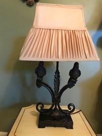 Table lamp with base of wrought iron birds