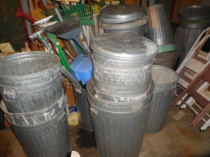 At least 15 galvanized cans with lids