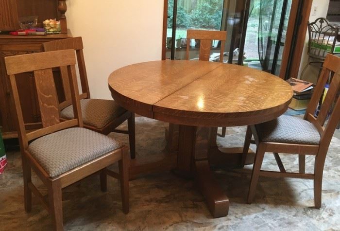 Table has two leaves and 6 chairs
