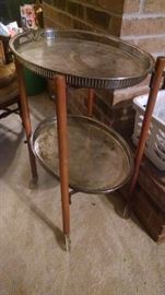 Vintage serving cart with trays.