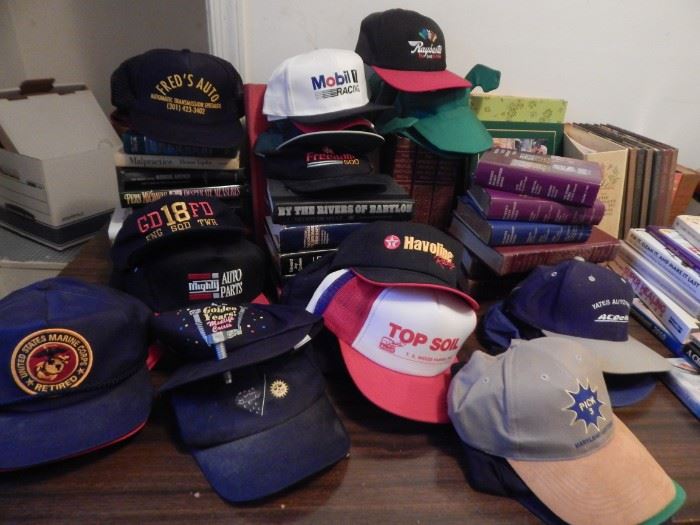 Baseball caps, many never worn but vintage and some are autographed.
