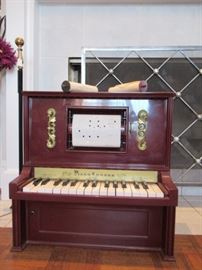 Child's player piano. Still works great